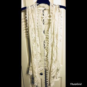 Lace sleeveless duster.